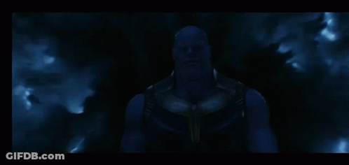 Thanos Standing In Front Of Smoke GIF