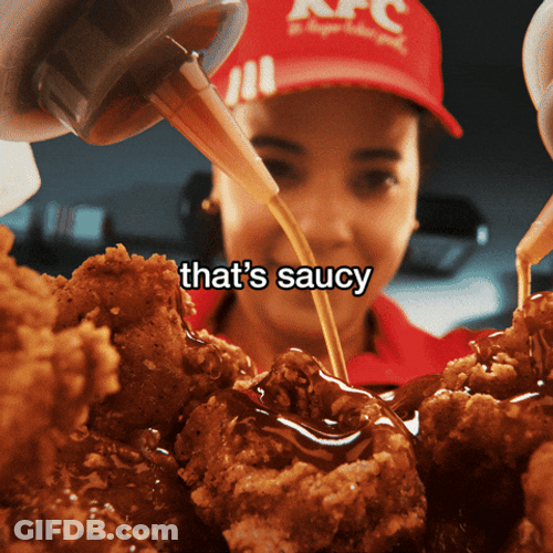Thats Saucy Woman Coating Chicken With Sauce GIF