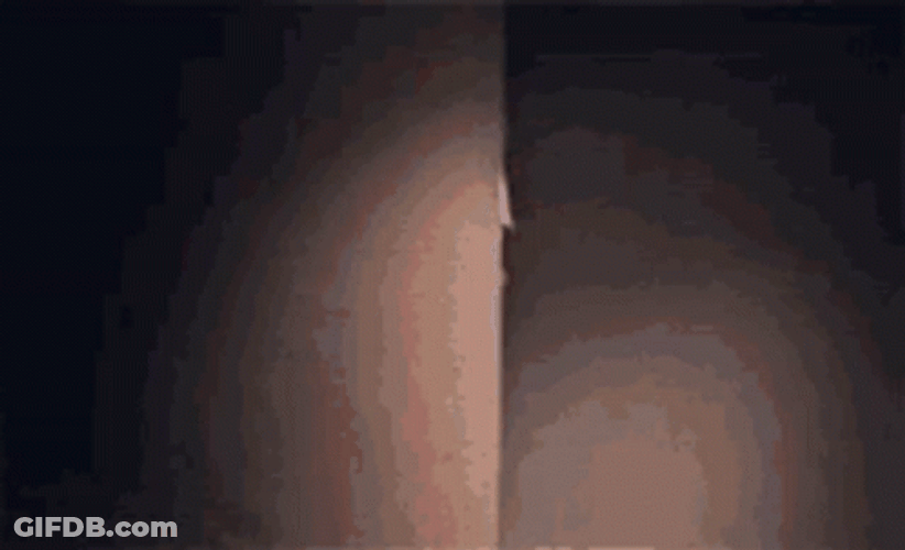 The Accountant Peeking Through A Corner GIF
