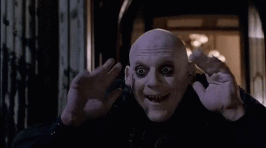 The Addams Family Fester Waving Hands GIF