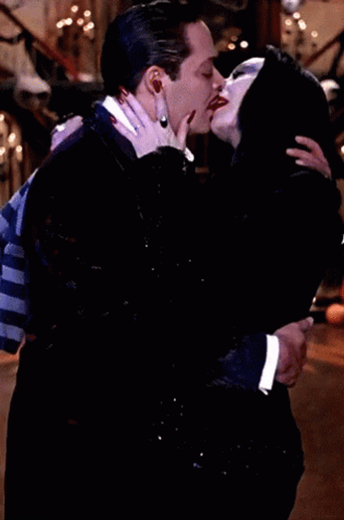 The Addams Family Morticia And Gomez Kissing GIF