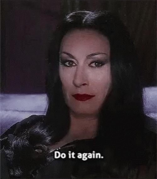 The Addams Family Morticia Challenging Face GIF
