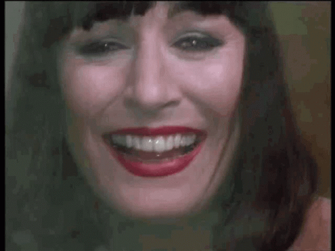 The Addams Family Morticia Hilarious Laugh GIF