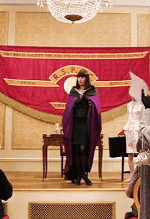 The Addams Family Morticia Posing Confidently GIF