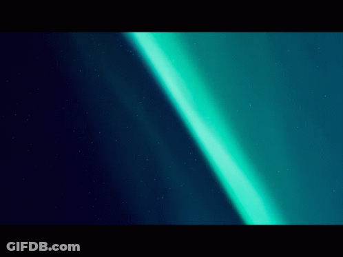 The Aurora Borealis Is Visible In The Night Sky Above The Northern Lights GIF