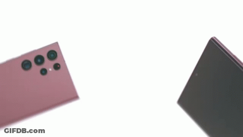 The Back Of A Cell Phone With A Pen On It GIF