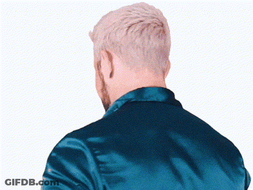 The Back Of A Man 'S Head With A Blue Jacket GIF