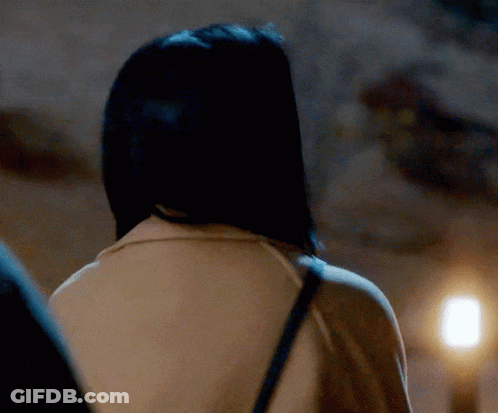 The Back Of A Woman 'S Head Is Shown In A Close Up GIF