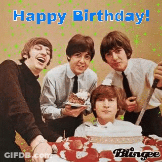 The Beatles Are Celebrating Their Birthday By Cutting A Cake With A Knife . GIF