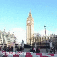 The Big Ben Clock Tower In London Is Surrounded By People GIF