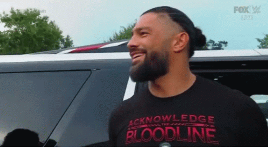 The Bloodline WWE Members Low Fives GIF
