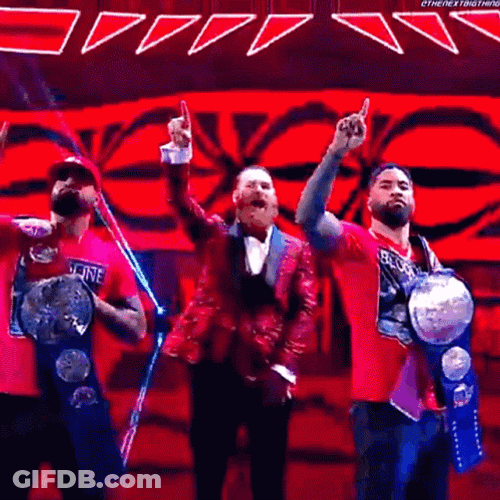 The Bloodline WWE Raising Their Hands GIF
