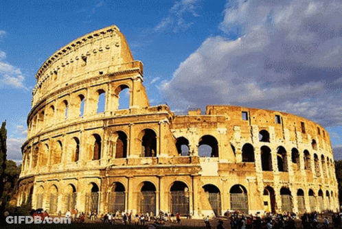The Colosseum In Rome Is A Large Building With Arches GIF