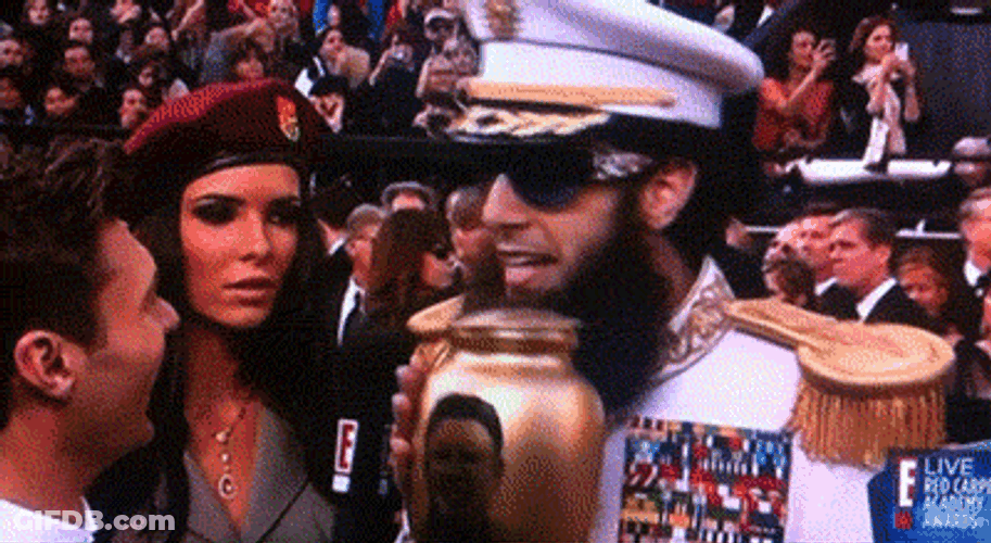 The Dictator Aladeen Accidentally Pouring Ashes Onto Man GIF