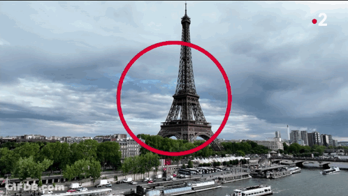 The Eiffel Tower Is Surrounded By A Red Circle With The Number 2 On The Bottom Right GIF