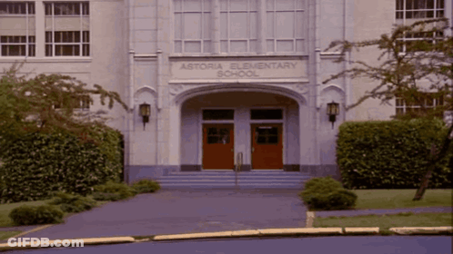 The Entrance To Astoria Elementary School Is Shown From The Street GIF