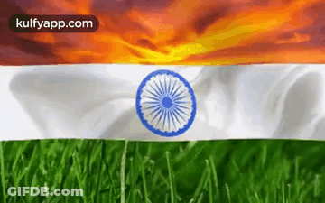 The Flag Of India Is Waving In The Wind With A Sunset In The Background GIF