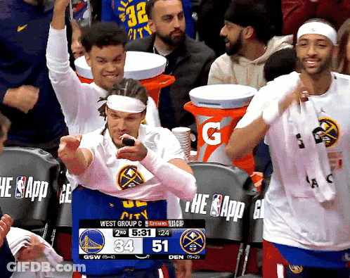 The Golden State Warriors Are Playing The Denver Nuggets In A Game GIF