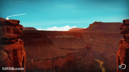 The Grand Canyon Is Written On The Side Of A Mountain GIF