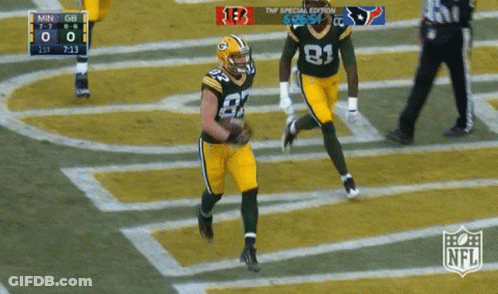 The Green Bay Packers Are Playing The Texans On The Field GIF