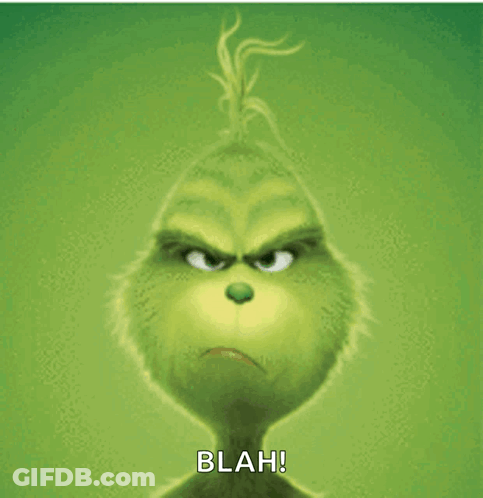 The Grinch From The Movie The Grinch Has A Very Angry Look On His Face And Says Blah GIF