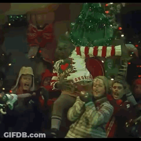 The Grinch Is Wearing A Sweater That Says Ho Ho Ho GIF