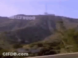 The Hollywood Sign Is On Top Of A Hill GIF