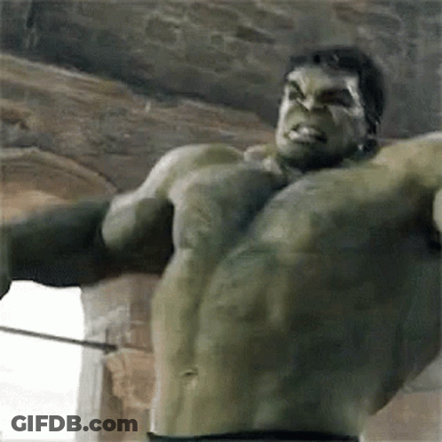 The Hulk Is Holding A Sword In His Hand And Looking At The Camera . GIF