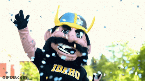 The Idaho Mascot Is Wearing A Black Shirt With Idaho On It GIF
