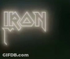 The Iron Maiden Logo Is Lit Up On A Black Background GIF