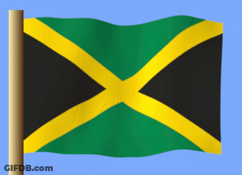 The Jamaican Flag Is Waving In The Wind Against A Blue Sky GIF