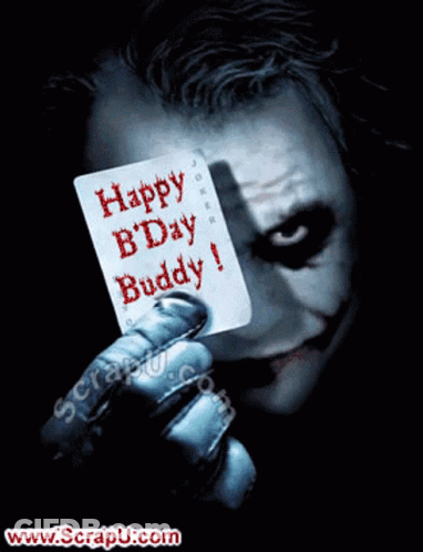The Joker Is Holding Up A Card That Says Happy Bday Buddy GIF