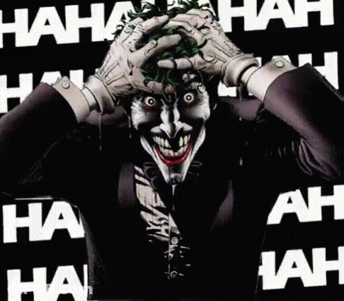 The Joker Is Making A Funny Face With His Hands On His Face GIF