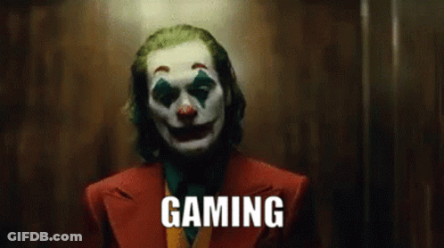 The Joker Is Wearing A Clown Mask And The Word Gaming Is On The Screen . GIF
