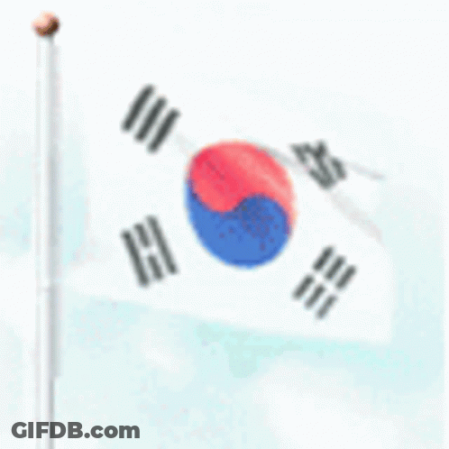 The Korean Flag Is Flying In The Wind On A Pole . GIF