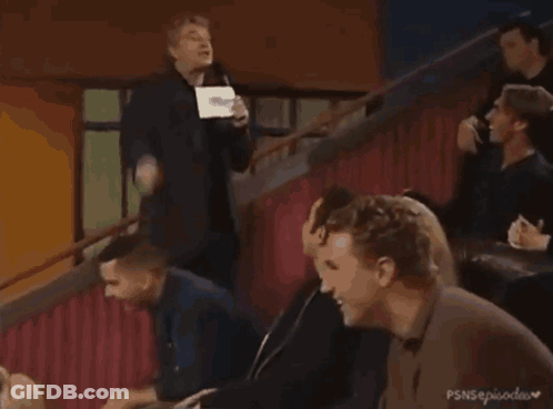 The Larry Winger Show Is Being Shown On A Television GIF