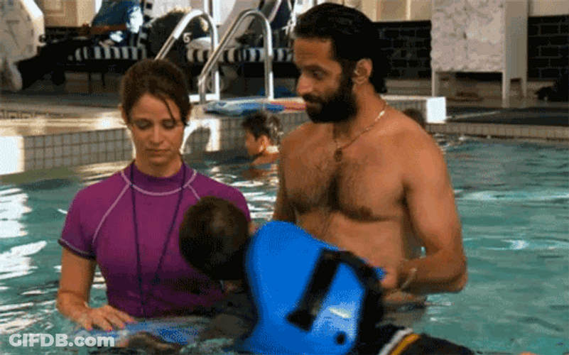 The League Dragging Kid From Swimming Pool GIF