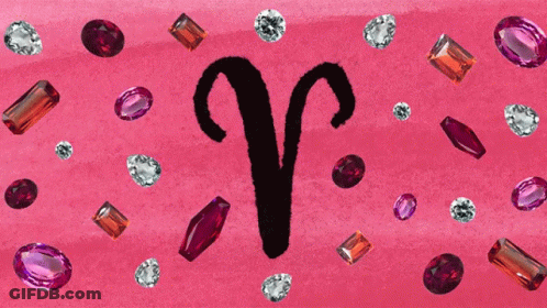 The Letter R Is On A Pink Background Surrounded By Various Colored Stones GIF