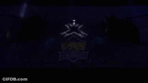 The Logo For Fenerbahce Is Projected Onto A Dark Background GIF