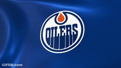 The Logo For The Oilers Is On A Blue Cloth GIF