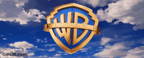 The Logo For Warner Bros Pictures Against A Blue Sky With Clouds GIF