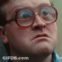 The Man Is Wearing Glasses And Making A Funny Face . GIF