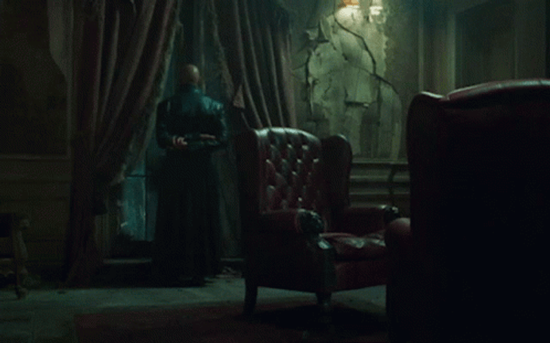 The Matrix Morpheus Turning Around Wicked Smirk GIF