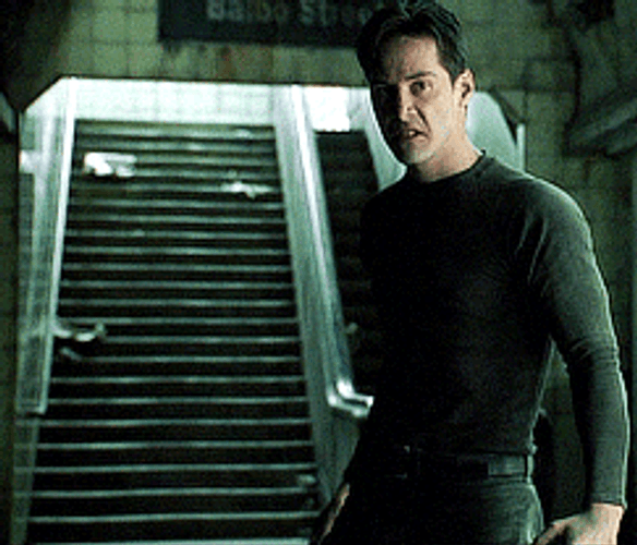 The Matrix Neo Flexing Muscles Ready To Battle GIF
