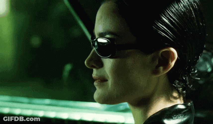 The Matrix Trinity Smiling GIF