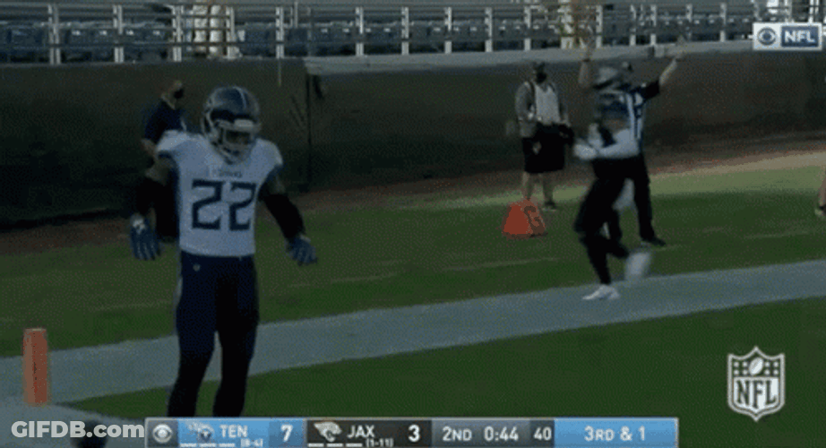 The Mighty Derrick Henry Stiff Arm GIF