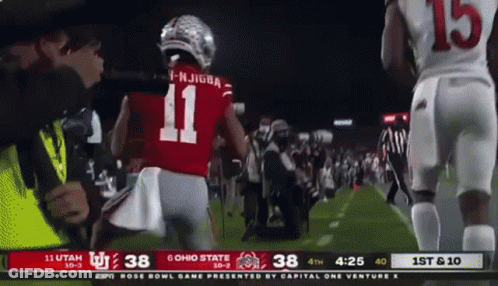 The Number 11 Is On The Back Of A Football Player 'S Jersey GIF