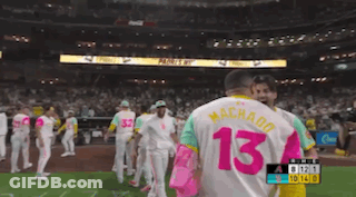 The Number 13 Is On The Back Of A Baseball Player GIF