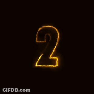 The Number 2 Is Lit Up In The Dark GIF