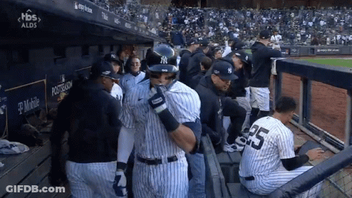 The Number 25 Is On The Back Of A Baseball Player GIF